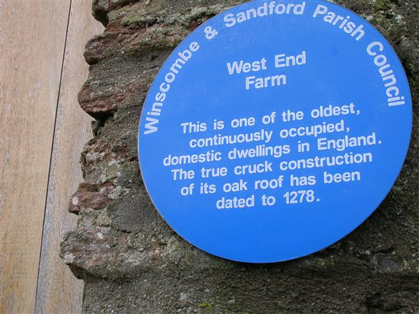 a plaque describing west end farm